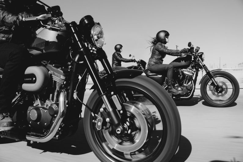 Motorcycle Upgrades - black and white photo of people riding motorcycle