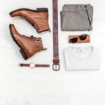 Men Accessories - pair of brown leather boots beside bet