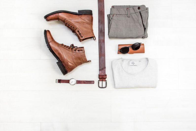 Men Accessories - pair of brown leather boots beside bet