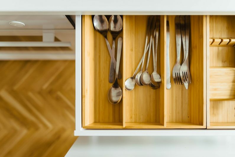 Home Organization - silver utensils in drawer