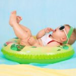 Baby Products - baby lying on inflatable ring