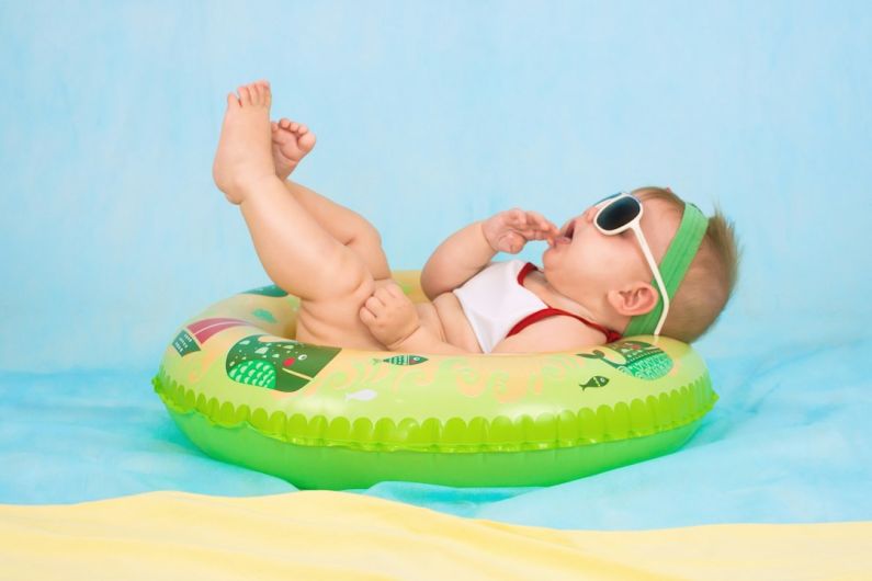 Baby Products - baby lying on inflatable ring