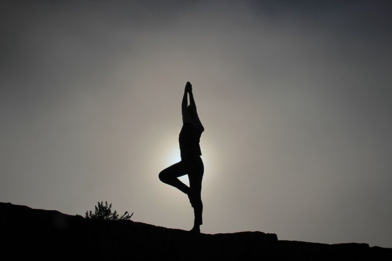 Yoga Beginners - person doing yoga exercises