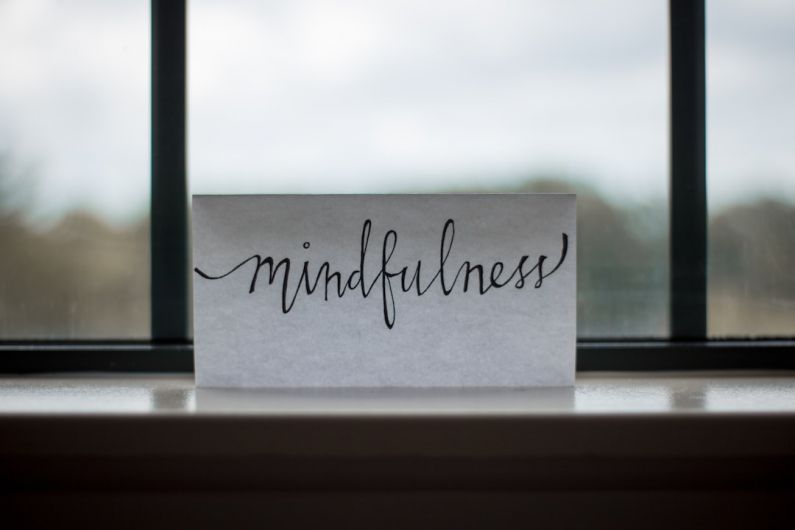 Improving Writing - mindfulness printed paper near window