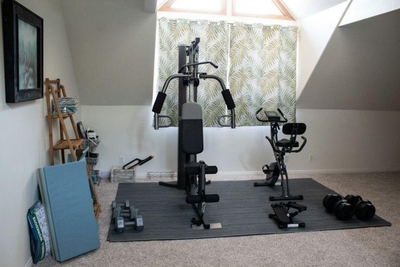 Home Gym - black and gray exercise equipment
