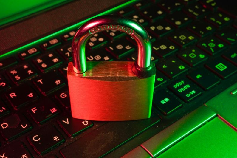 Data Security - red padlock on black computer keyboard